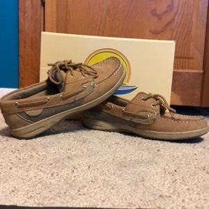 Well loved tan boat shoes.